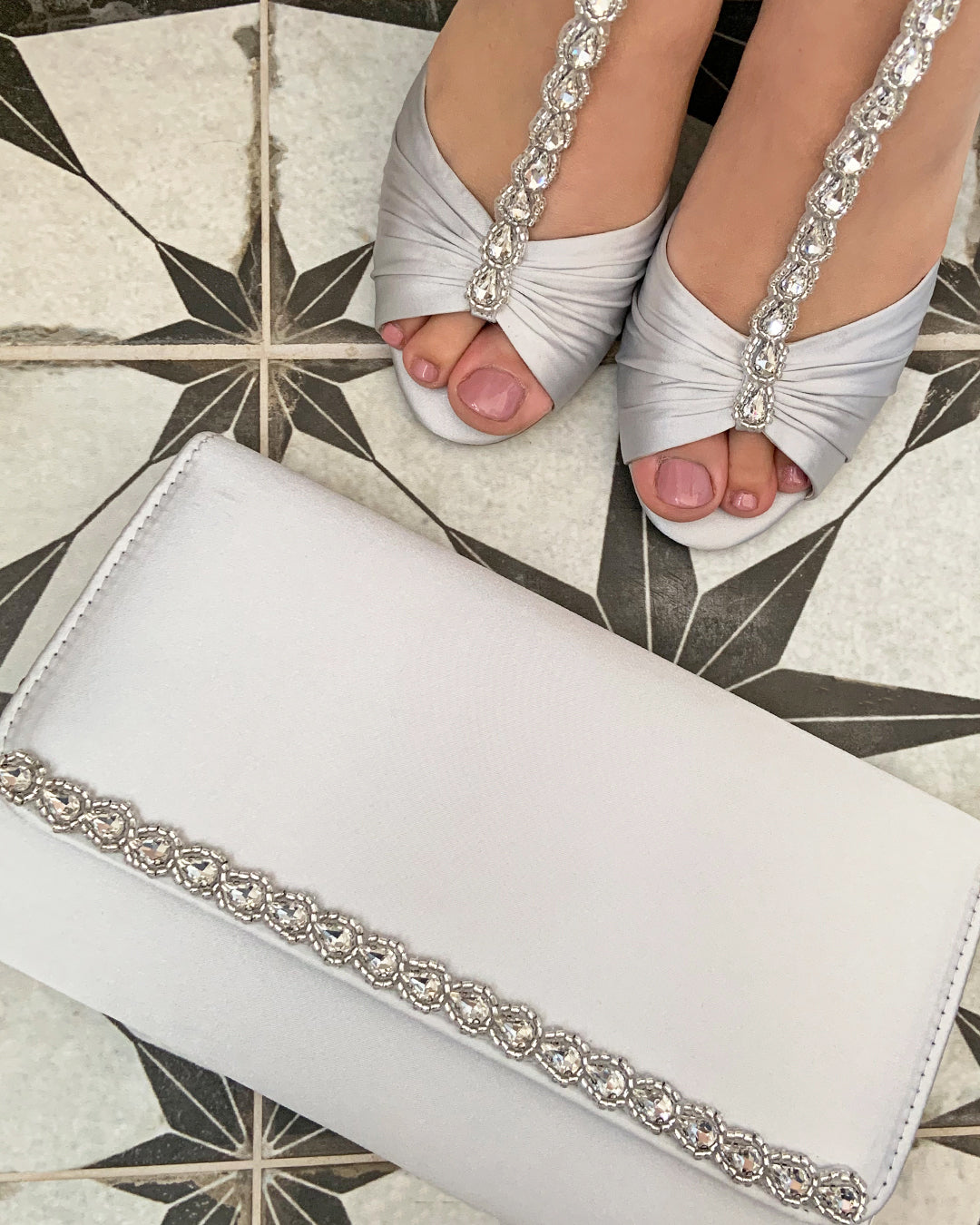 Dee silver satin embellished clutch bag