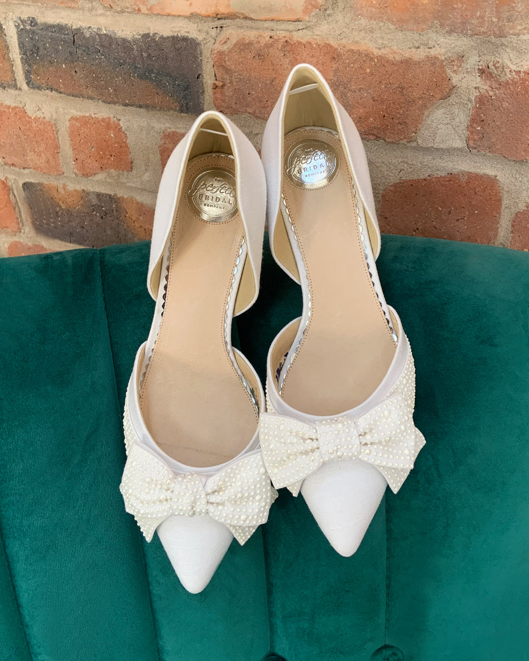 Adele ivory pearl bow points