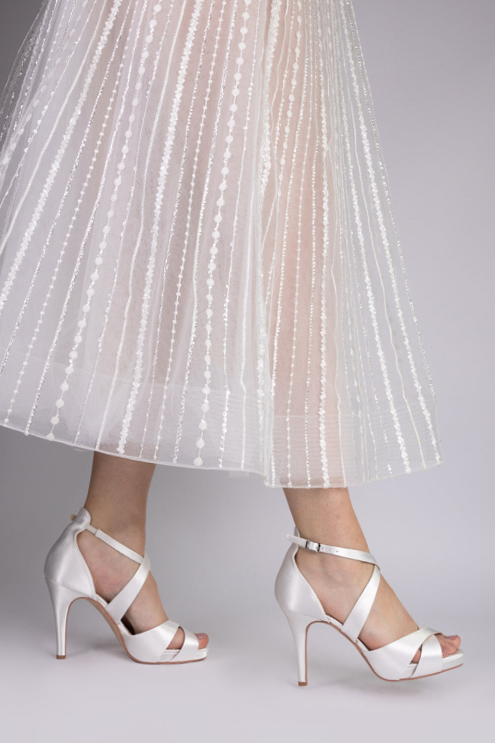 Kendall ivory crossover platform sandals