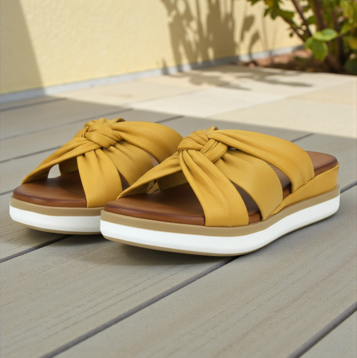 Leyla mustard leather twisted strap mule wedge