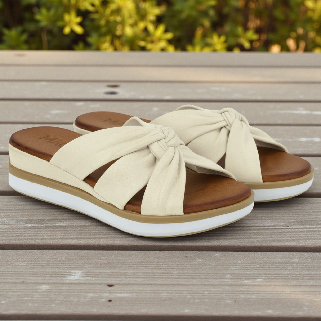 Leyla off-white leather twisted strap mule wedge