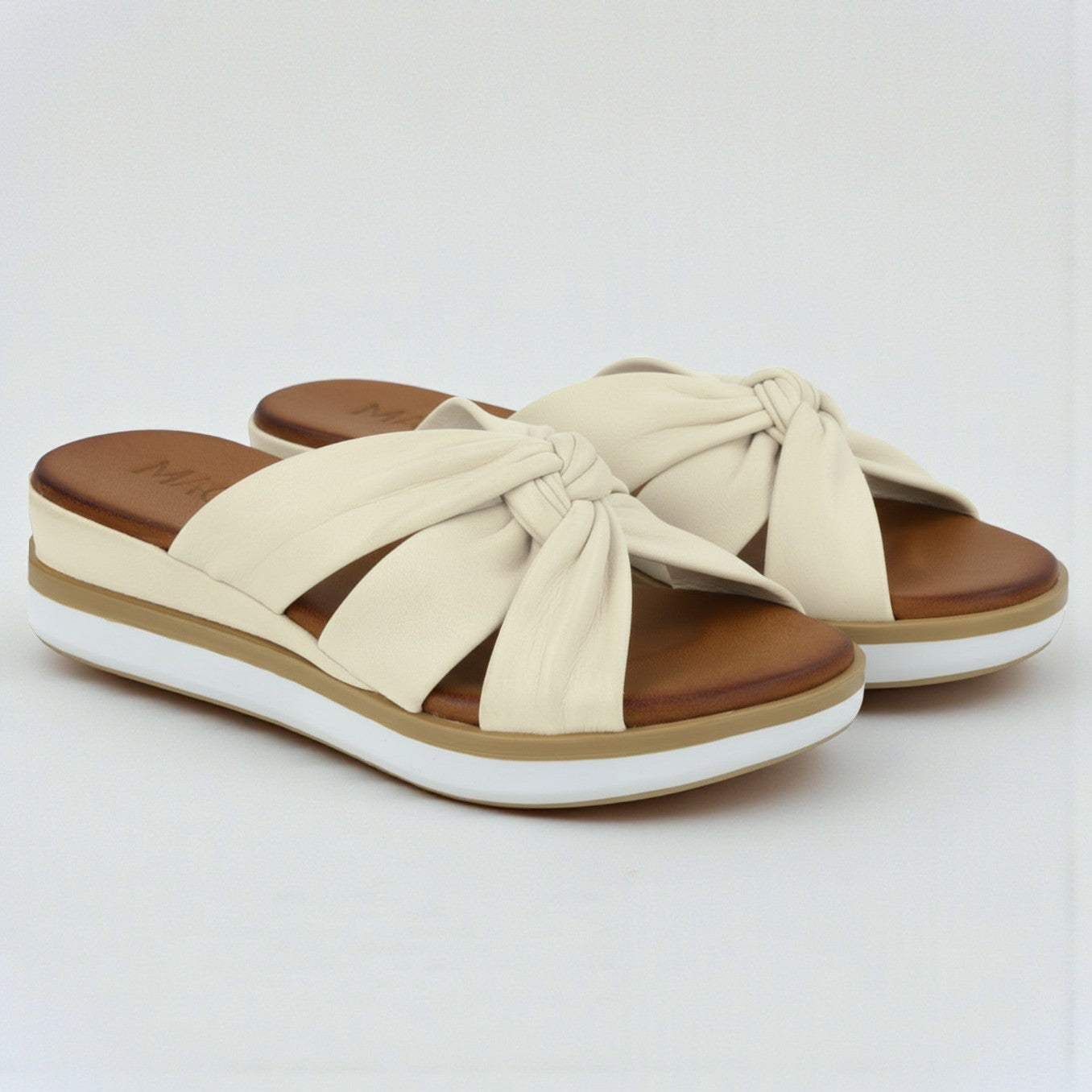 Leyla off-white leather twisted strap mule wedge