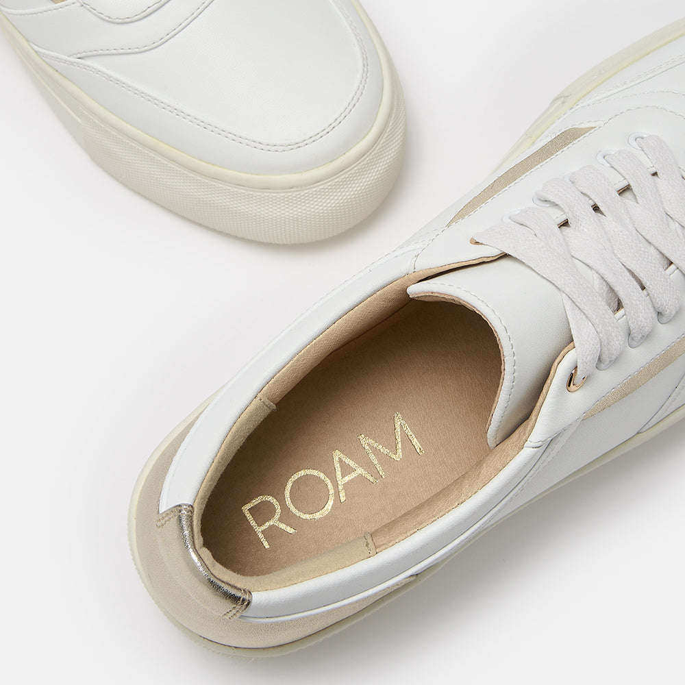 Mila white and gold platform trainers