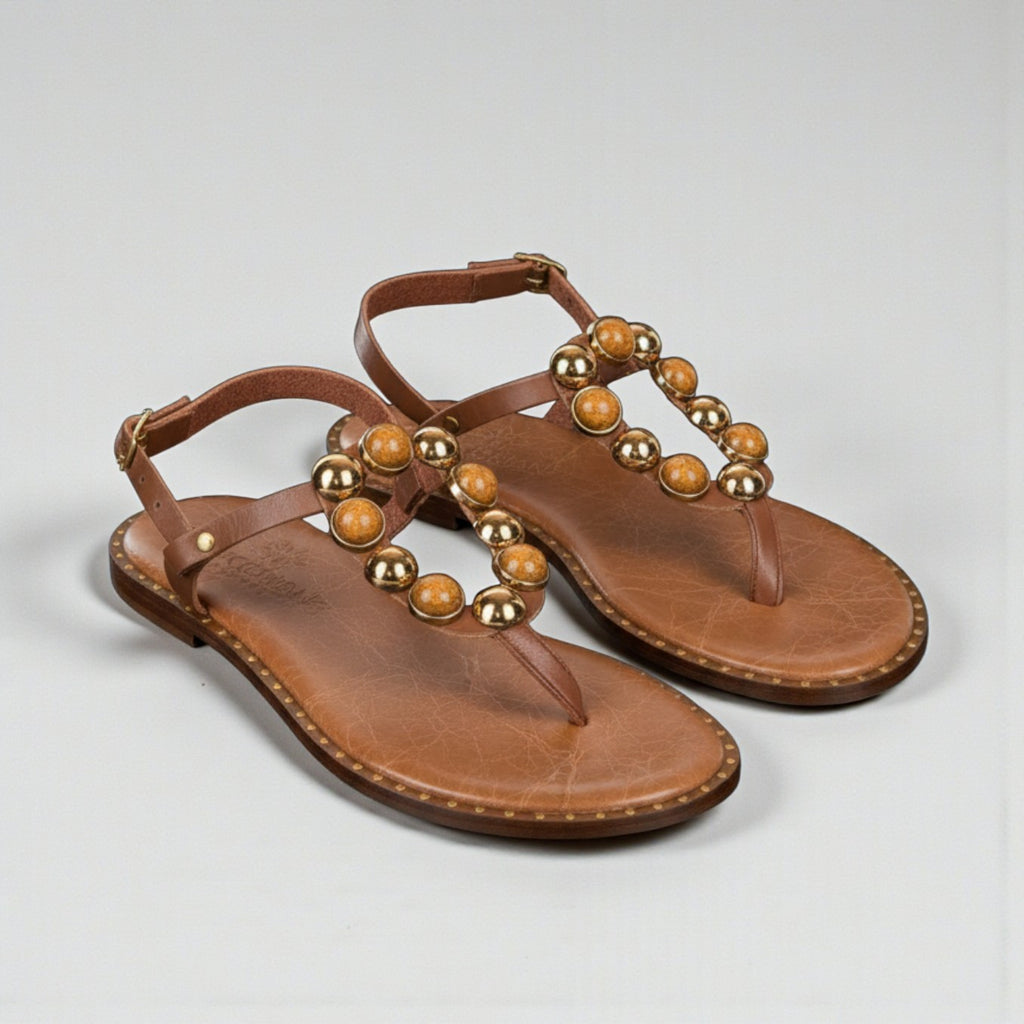 Naia tan leather Greek sandal with amber and gold stones