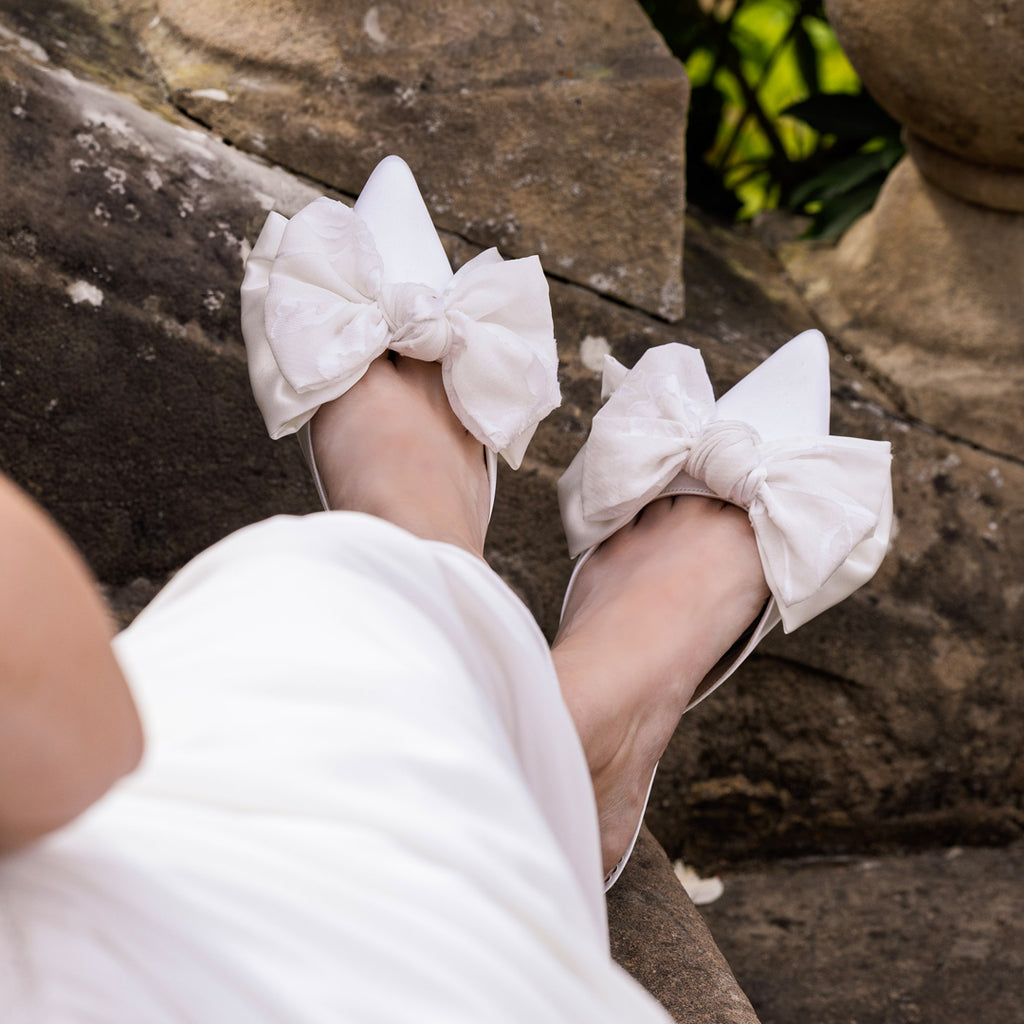 Priya ivory satin bow mules