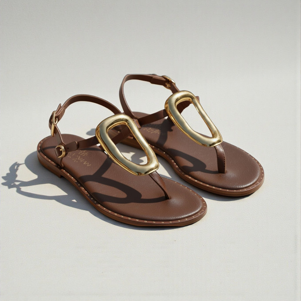 Thalia brown leather Greek sandal with statement gold loop