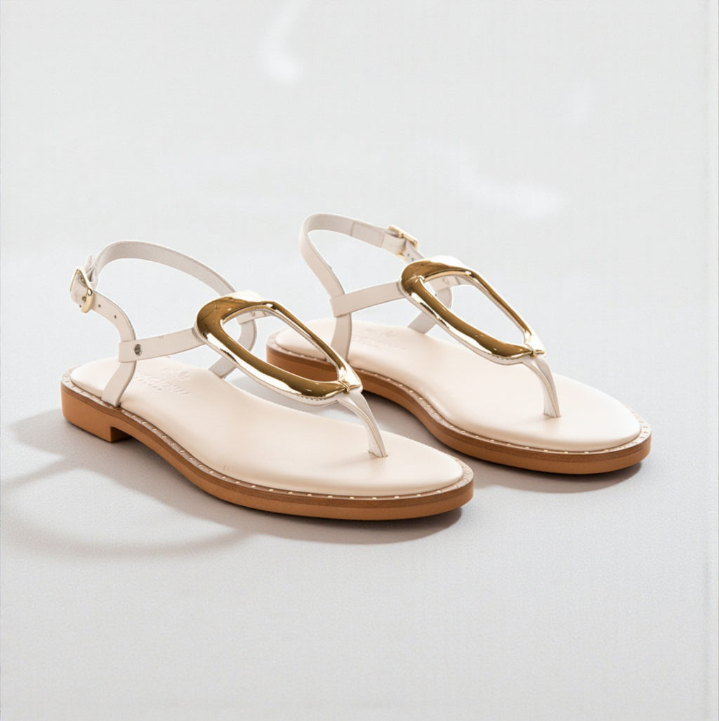 Thalia off-white leather Greek sandal with statement gold loop