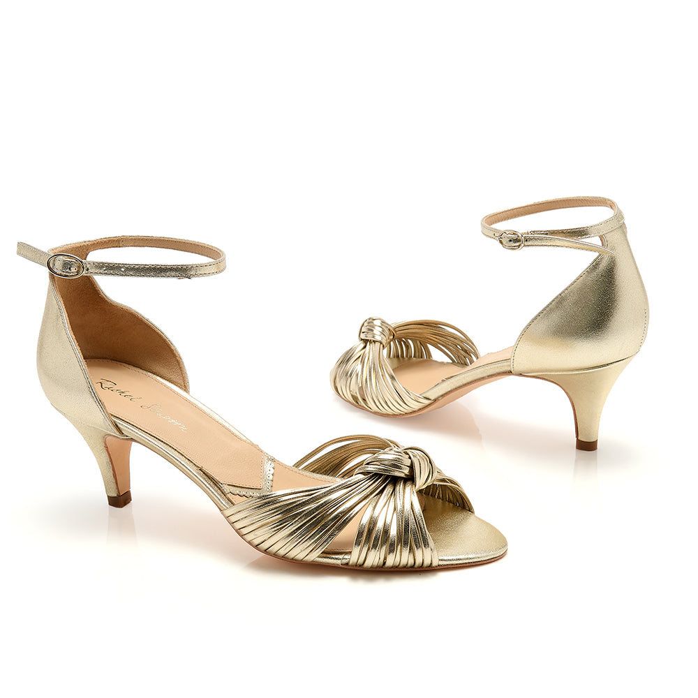 Gold low best sale heels uk